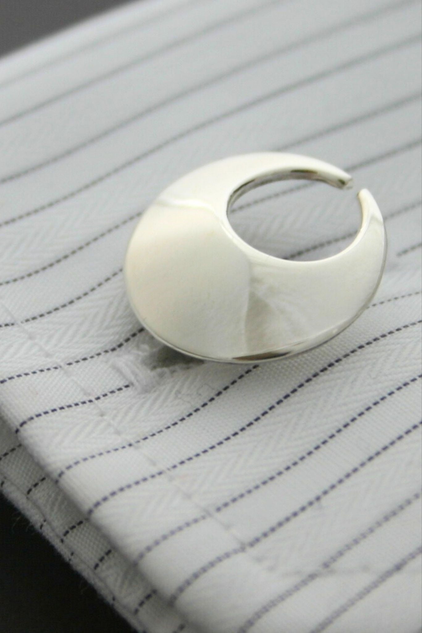 Irish torc cufflinks on shirt