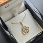 gold celtic motherhood knot pendant necklace in box