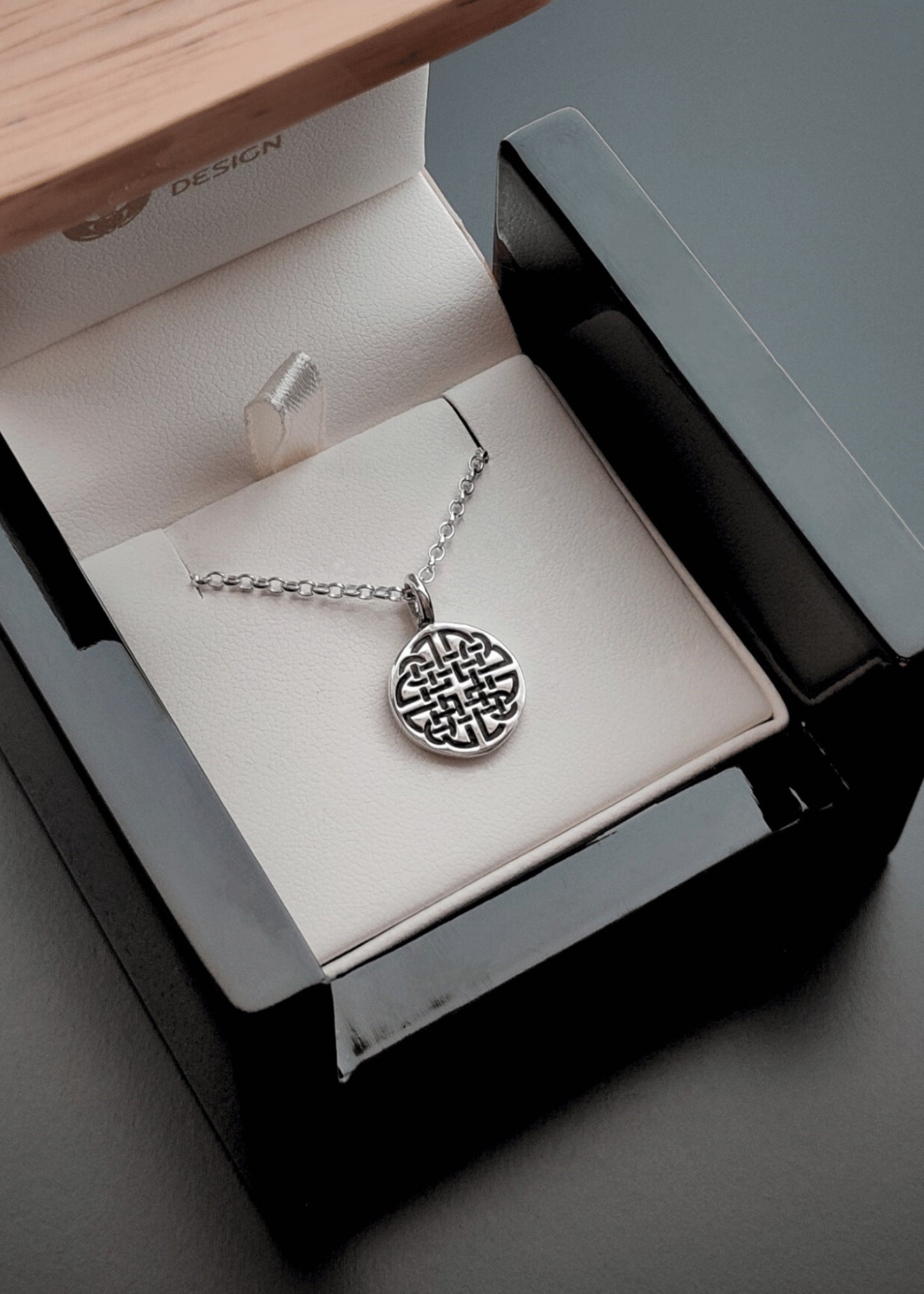 Dara Knot Pendant necklace in jewelry box 