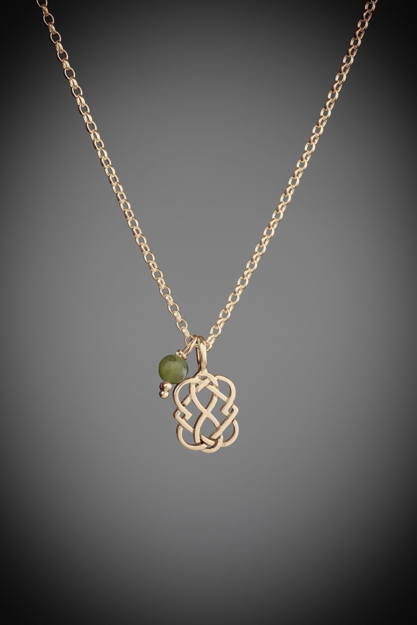 Gold celtic love knot necklace with connemara marble charm