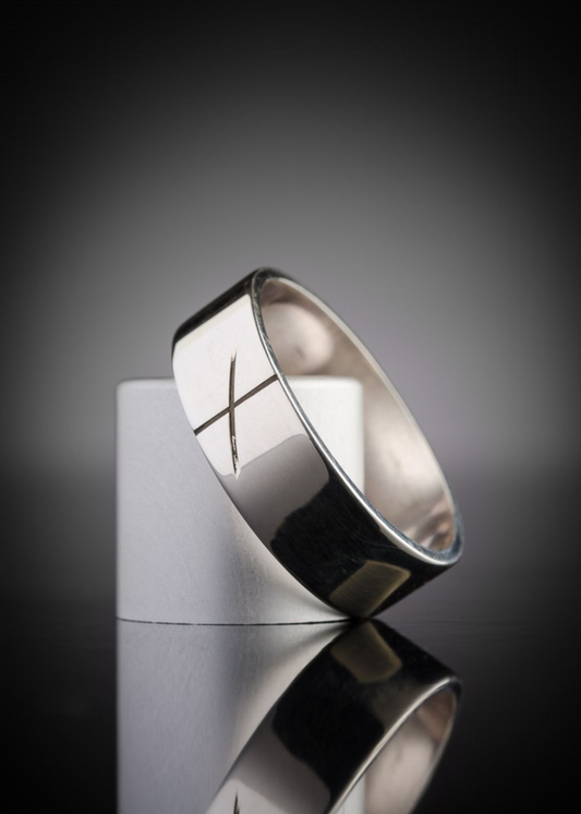 This image shows the men's silver ogham ring at an angle