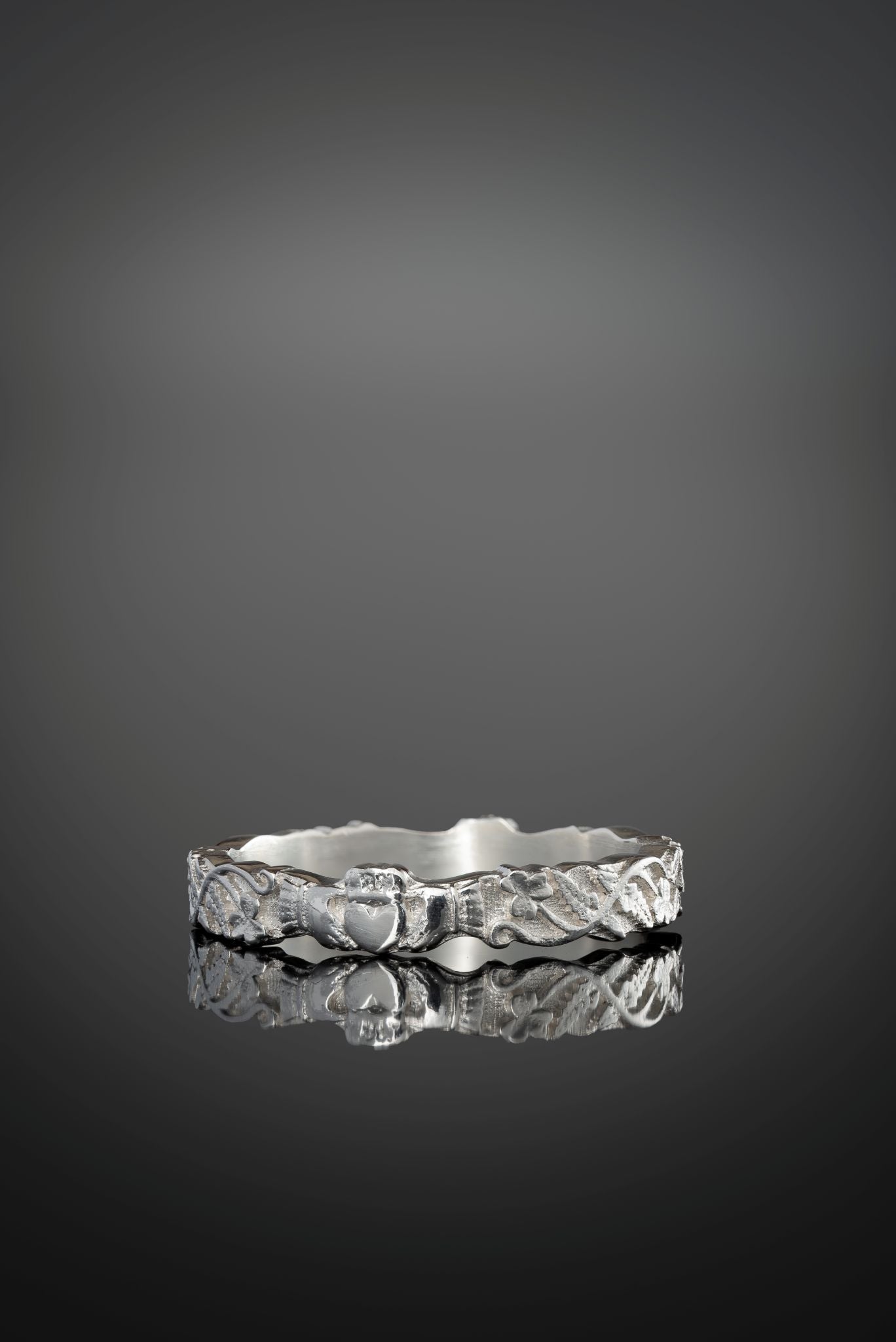 nature inspired fern shamrock claddagh ring detail