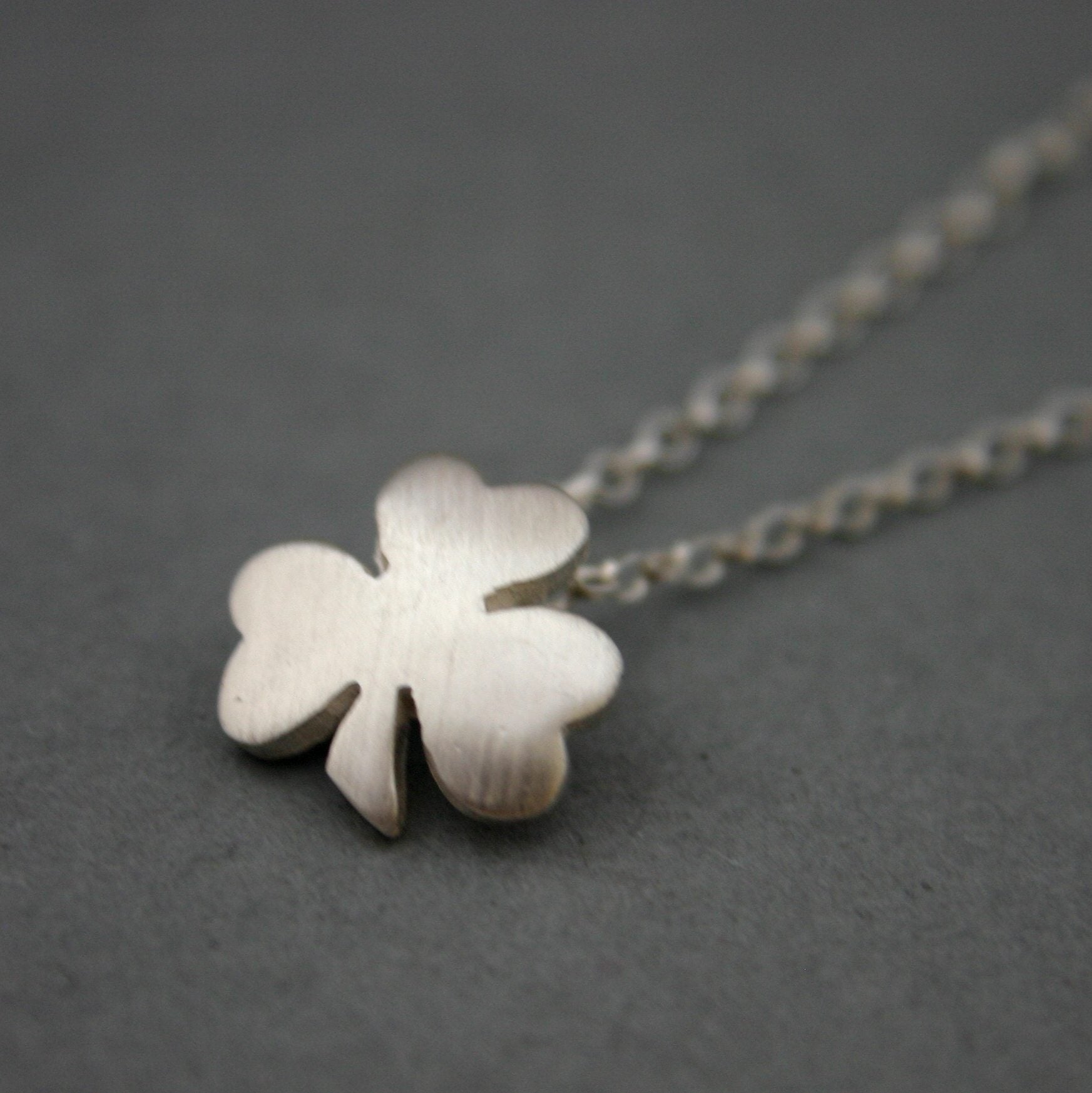 contemporary silver shamrock pendant