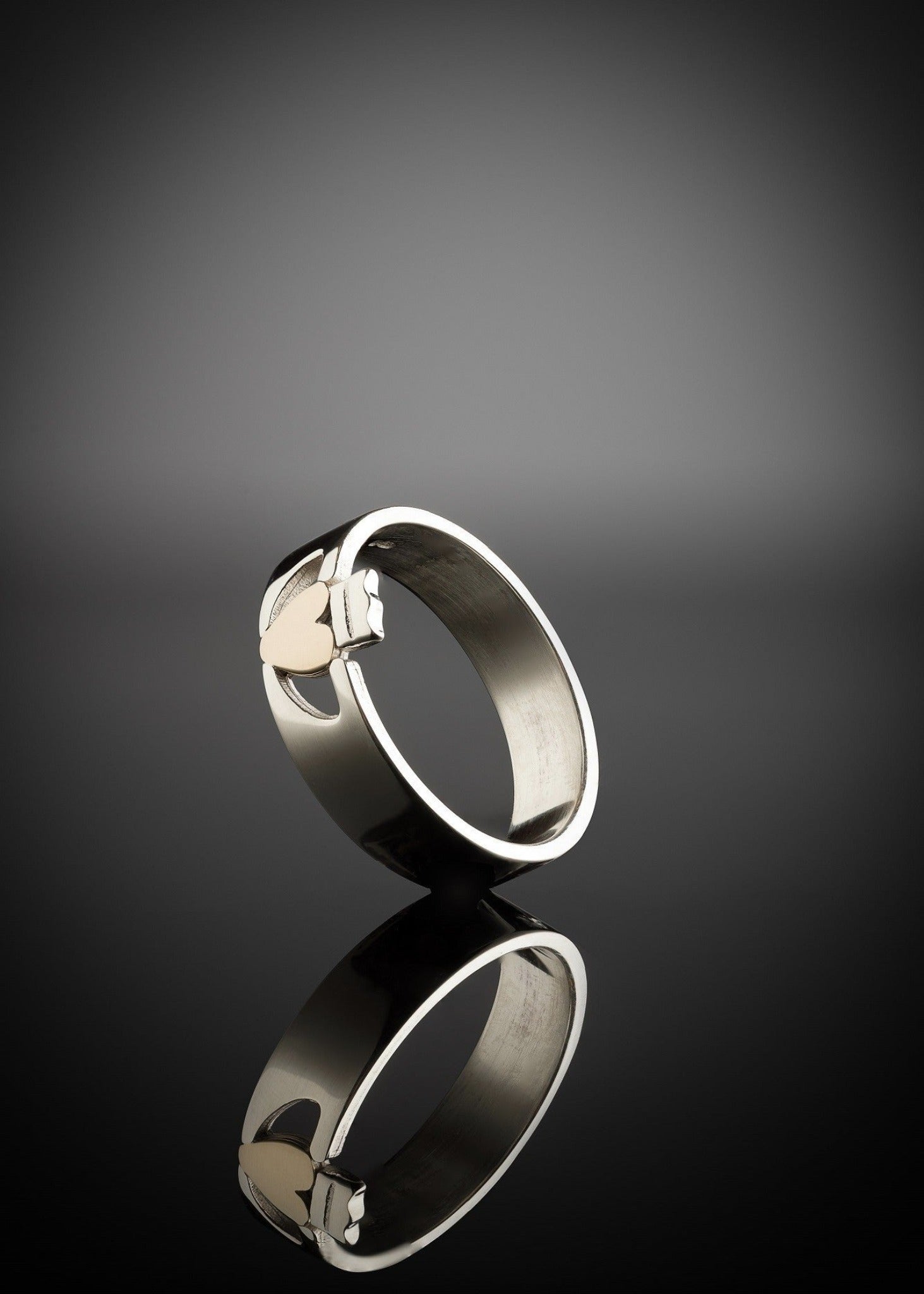 Two Tone Contemporary Claddagh Ring with gold heart