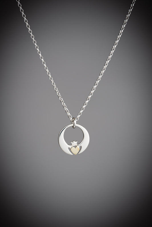 contemporary two tone Claddagh pendant 