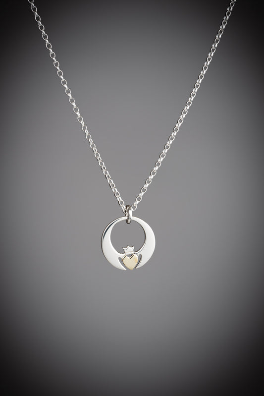 contemporary two tone Claddagh pendant