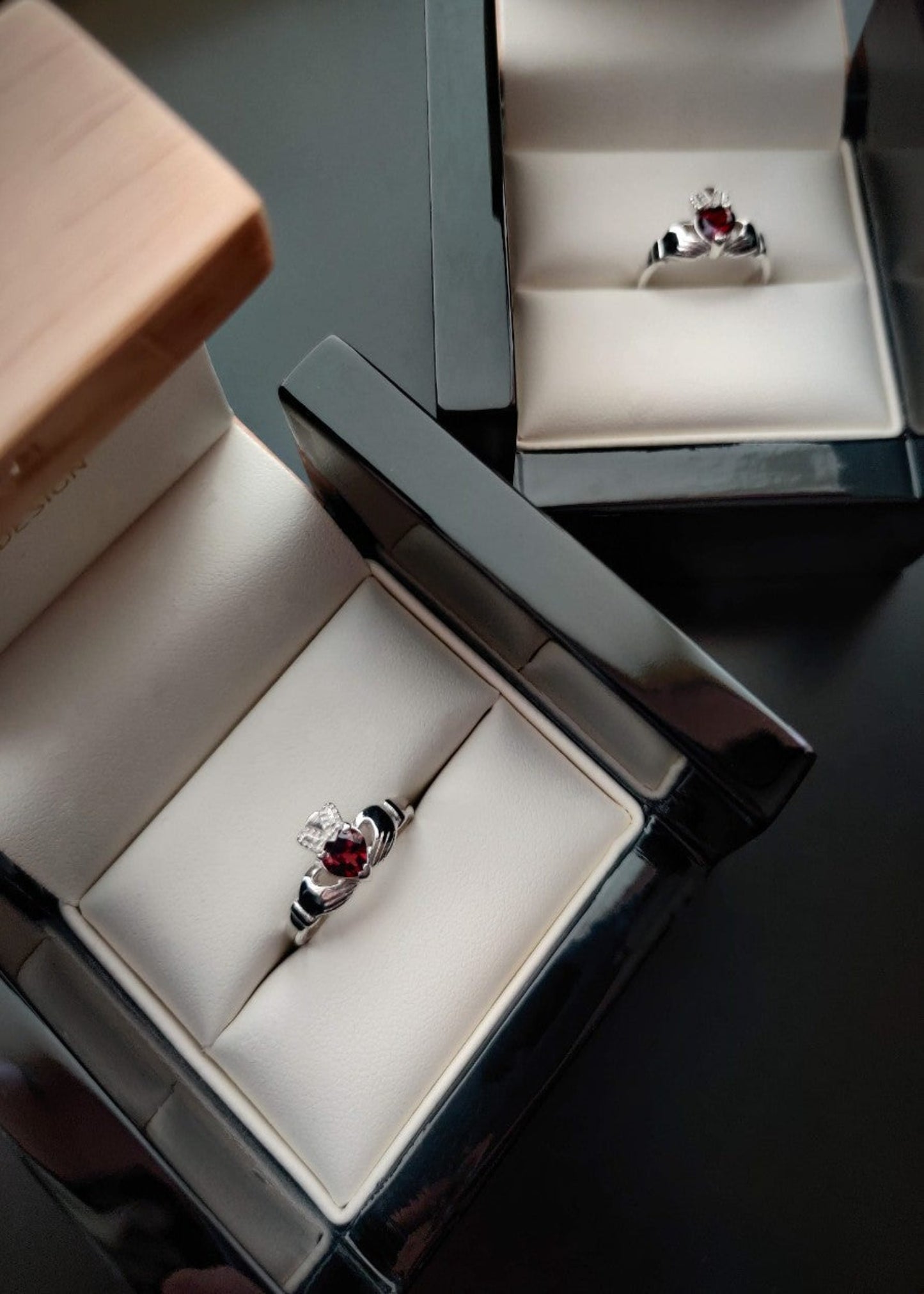 birthstone claddagh rings set with garnet heart