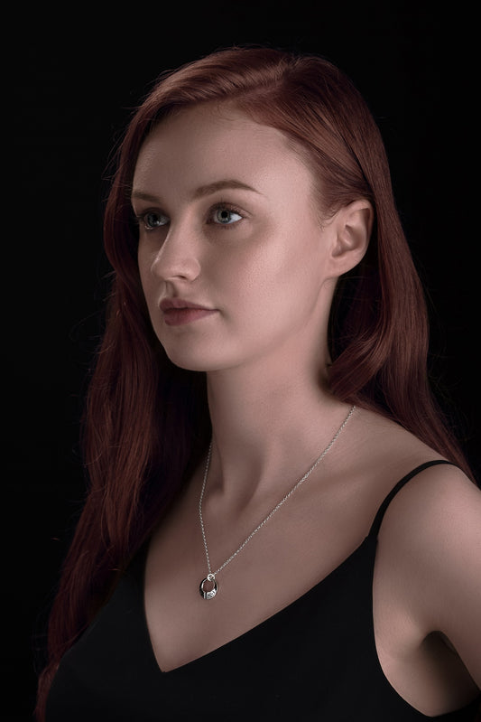 silver celtic torc pendant necklace on model