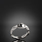 silver claddagh ring with twist band at an angle