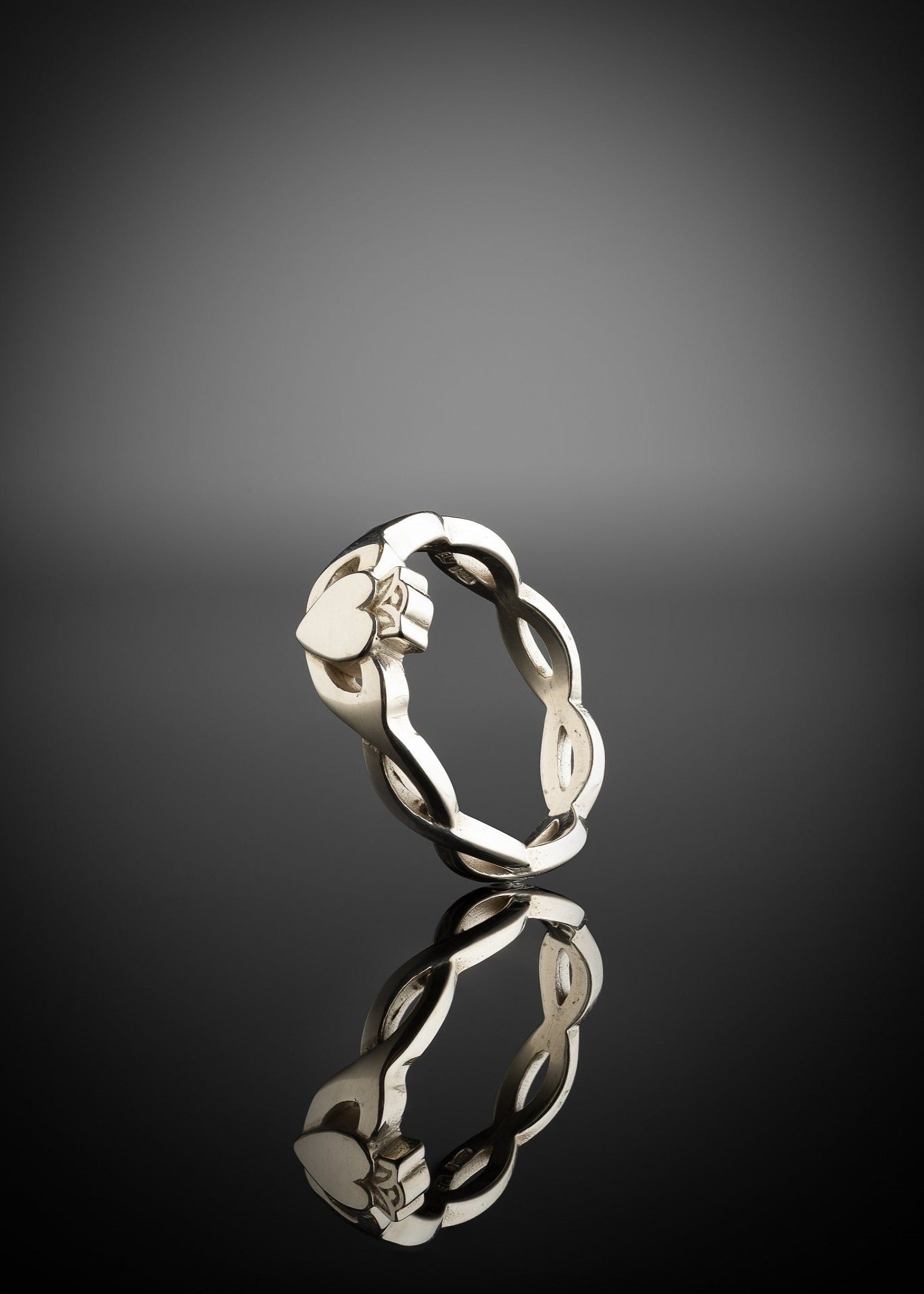 silver claddagh ring with twist band