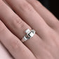 White gold claddagh ring on model