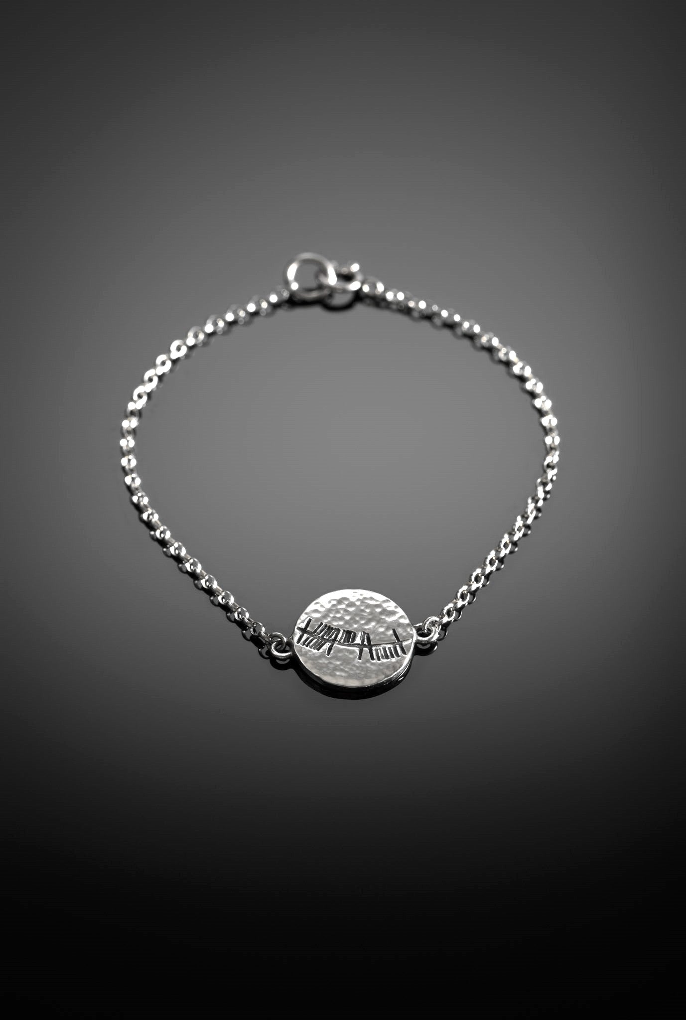 Anam cara bracelet in silver on black background
