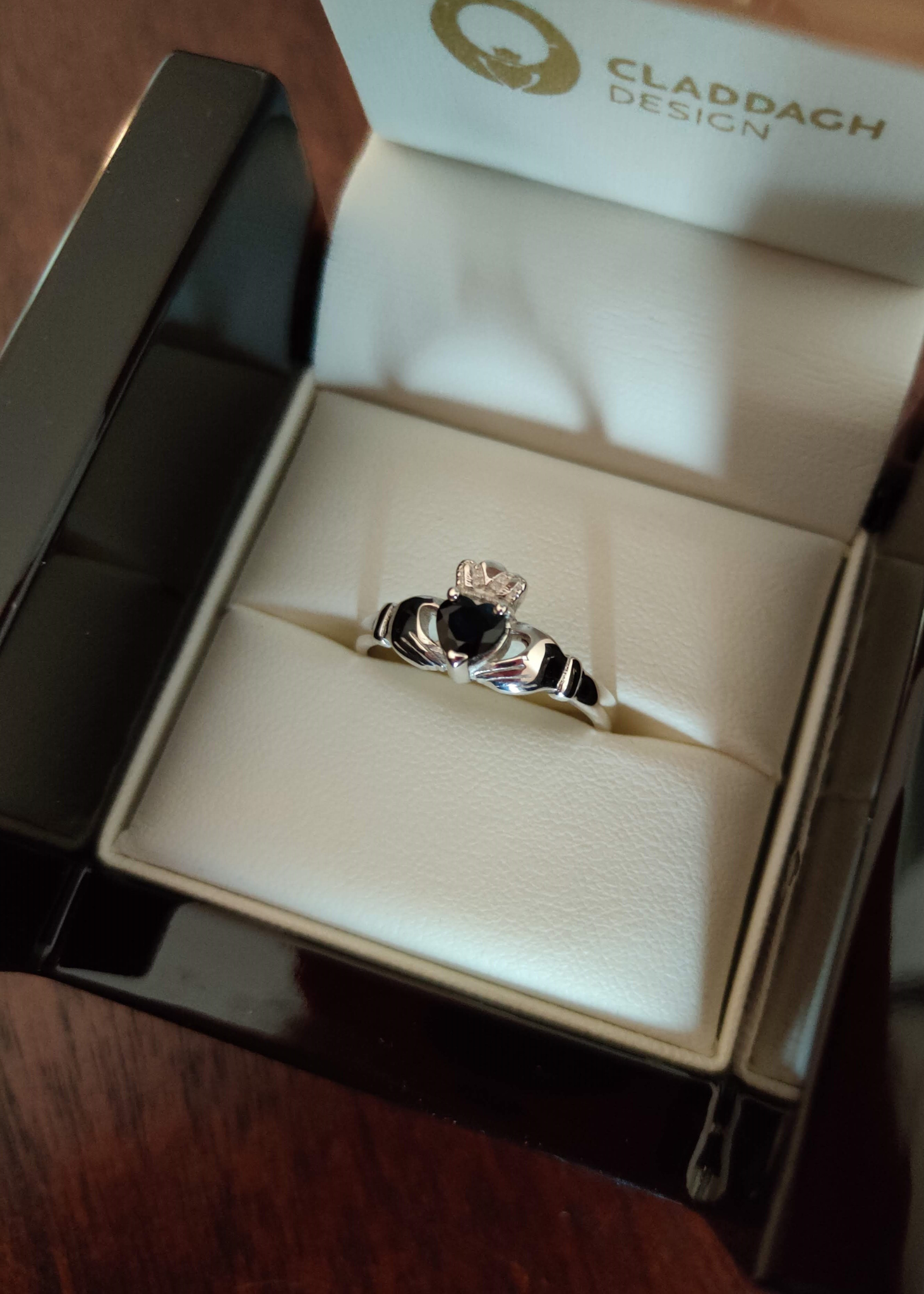 Gold claddagh ring with 2025 birthstone