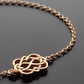 celtic love knot bracelet in gold close up