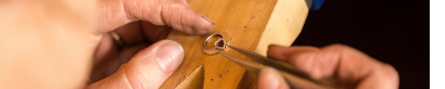 setting a gemstone heart in a contemporary claddagh pendant