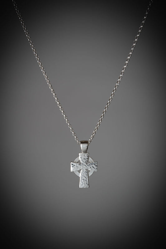 contemporary celtic cross pendant necklace in sterling silver with a weathered hammered finish