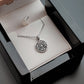 Dara Knot Pendant necklace in jewelry box 