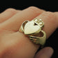 large chunky claddagh ring on model's finger