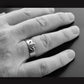 modern Claddagh ring on man's hand