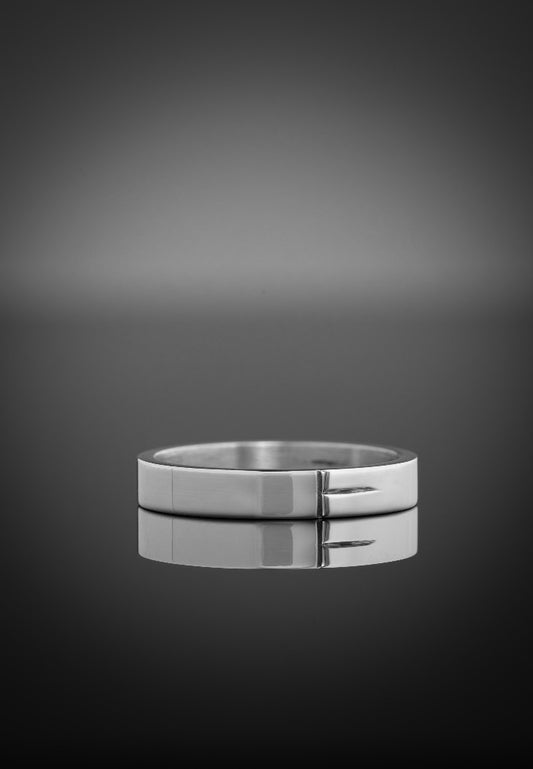 Ladies ogham wedding ring on a black background