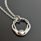 Close up image of Infinity Claddagh Pendant 