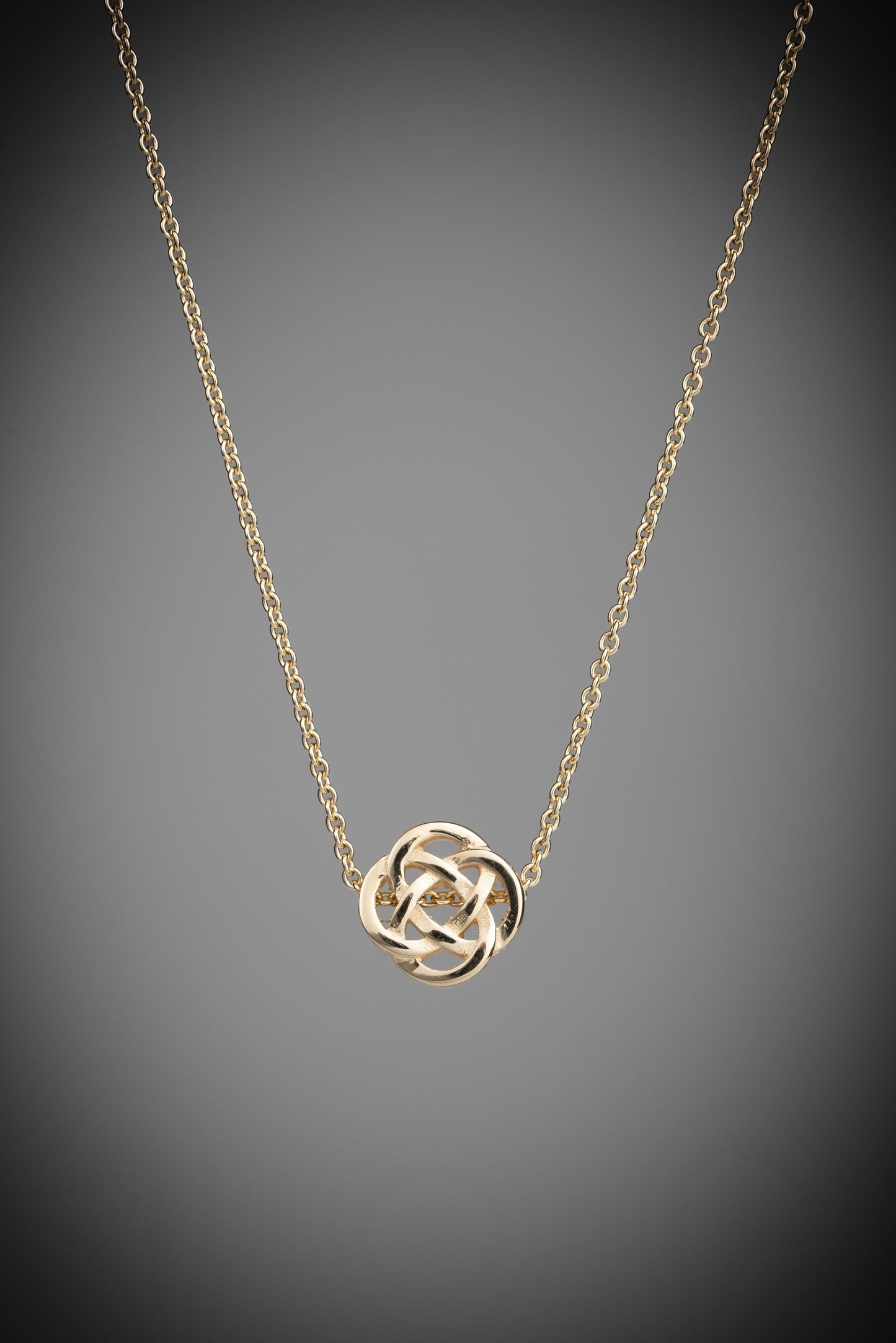gold celtic knot pendant
