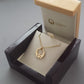 Gold Claddagh pendant in box
