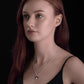 torc pendant necklace on model