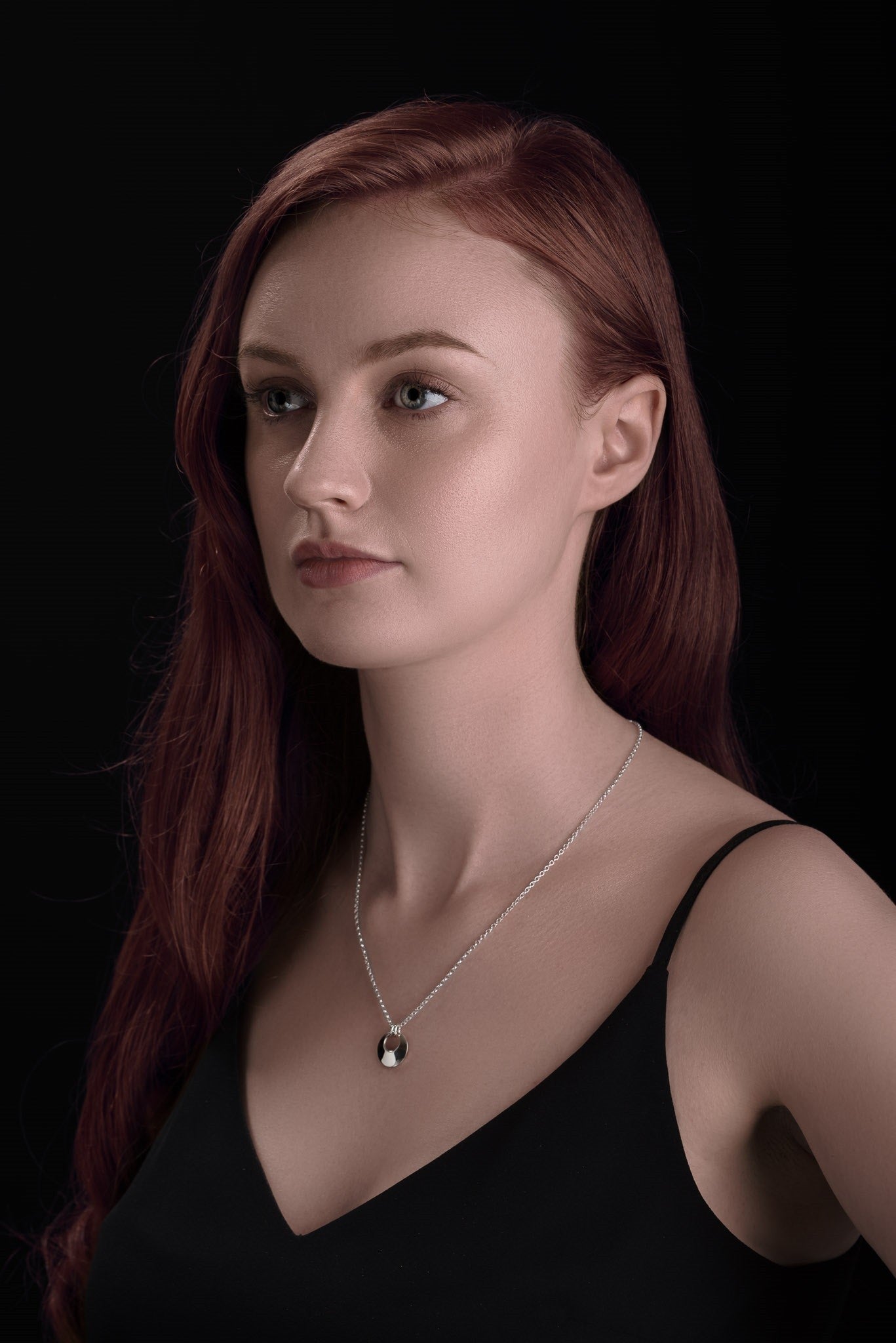 torc pendant necklace on model