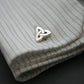 Silver Trinity Knot Cufflinks on a shirt cuff