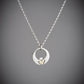contemporary two tone Claddagh pendant 