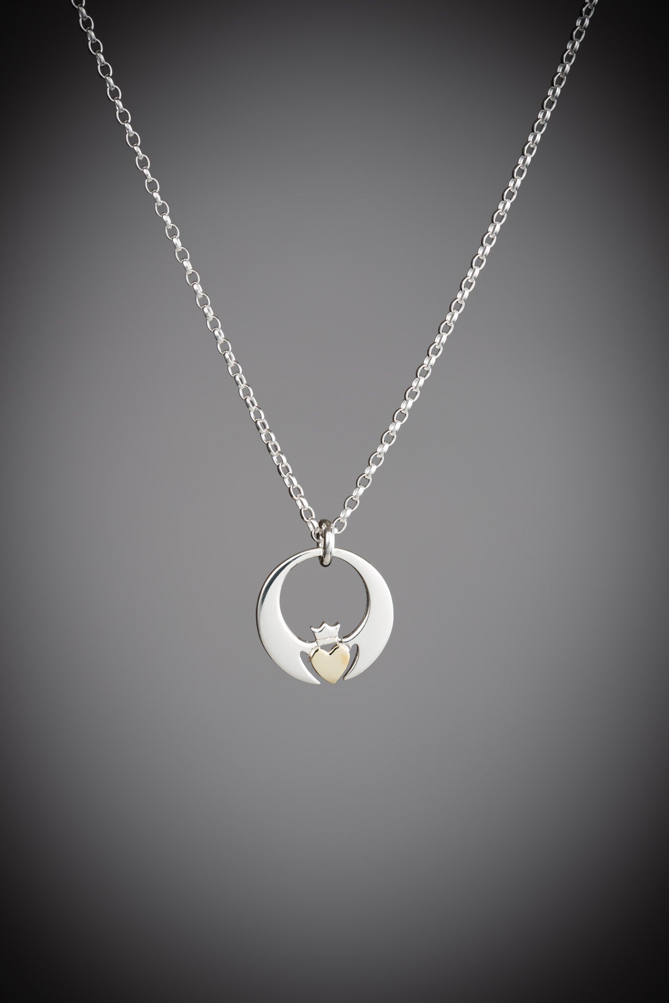 contemporary two tone Claddagh pendant 