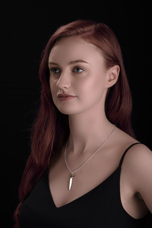 silver anam cara pendant with connemara marble worn by a model 