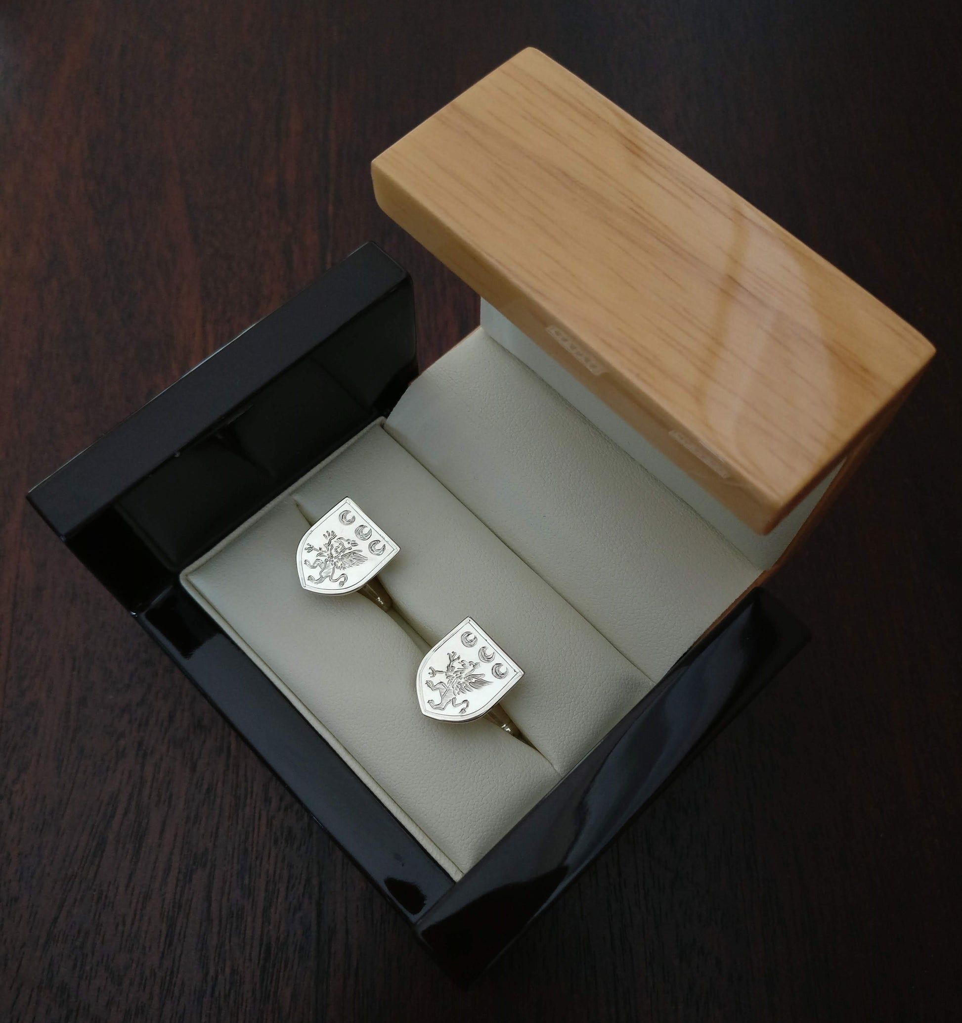 silver family crest cufflinks in box